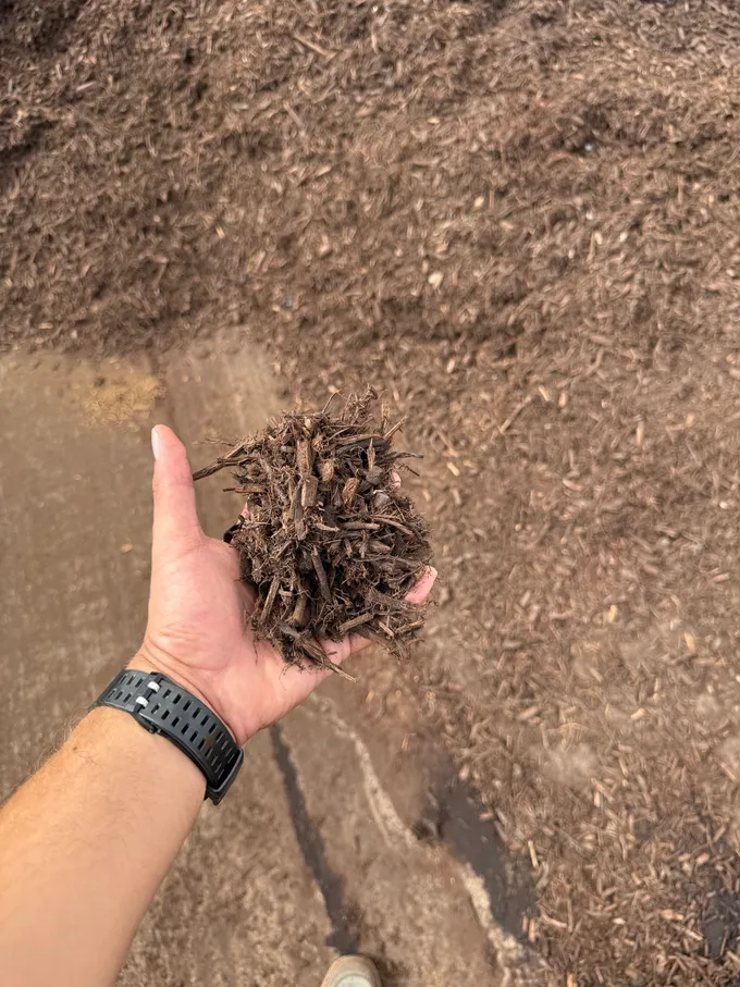 Organic brown mulch used as landscape ground cover